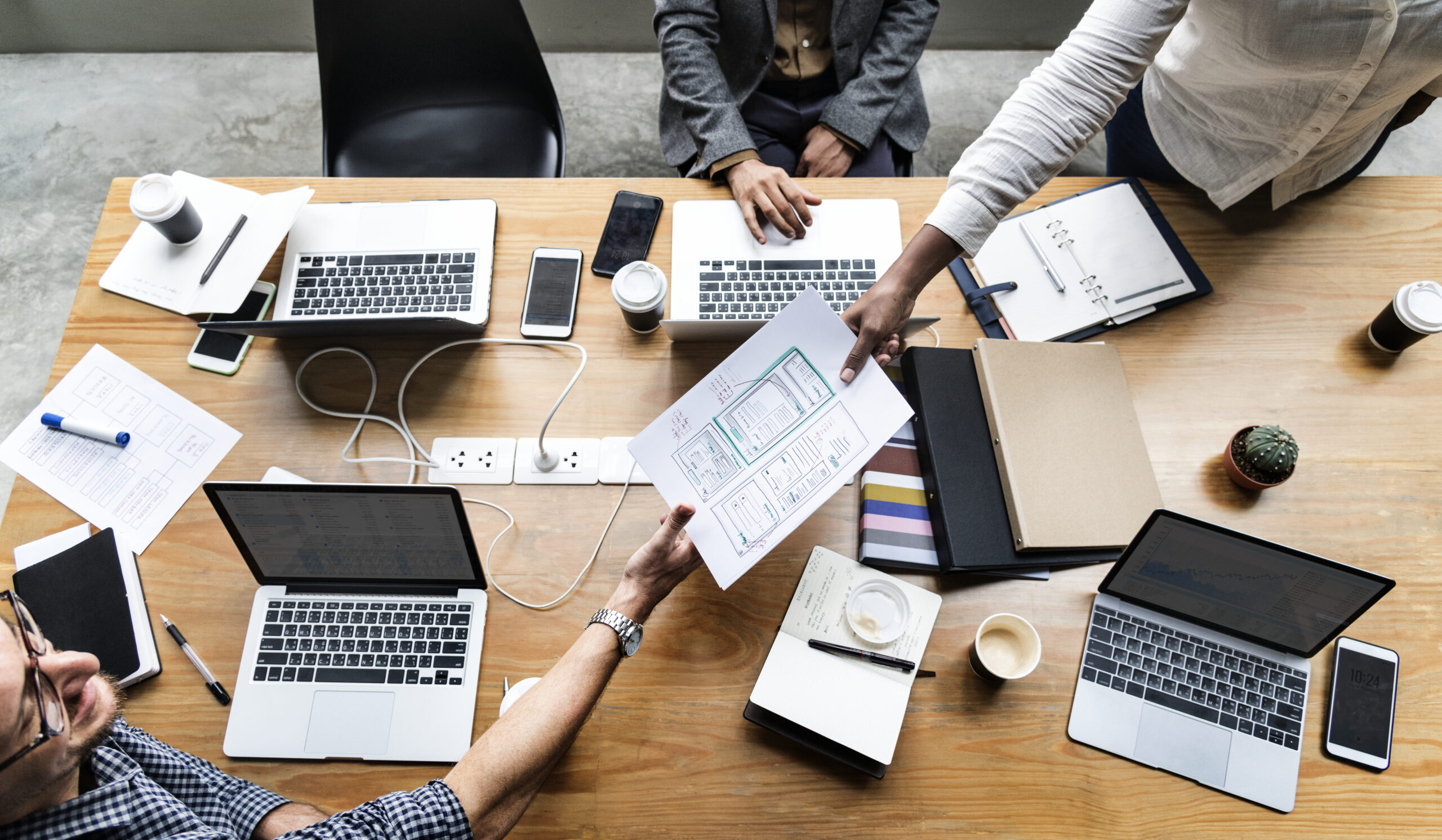 group of people working on website template